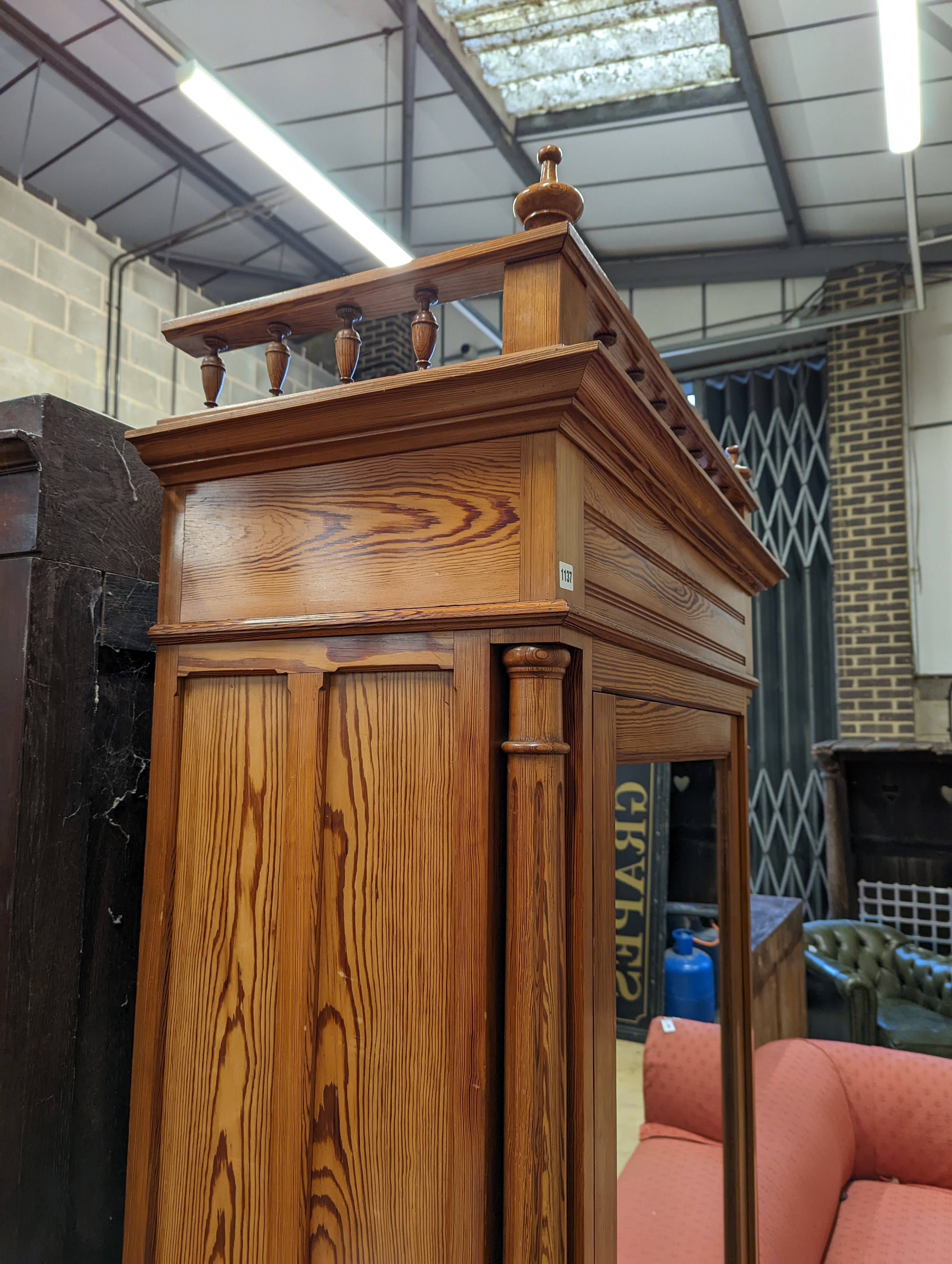 A 19th century French pitch pine mirrored armoire, width 107cm, depth 48cm, height 232cm